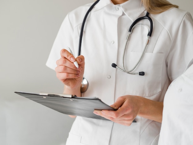 Close-up doctor with stethoscope