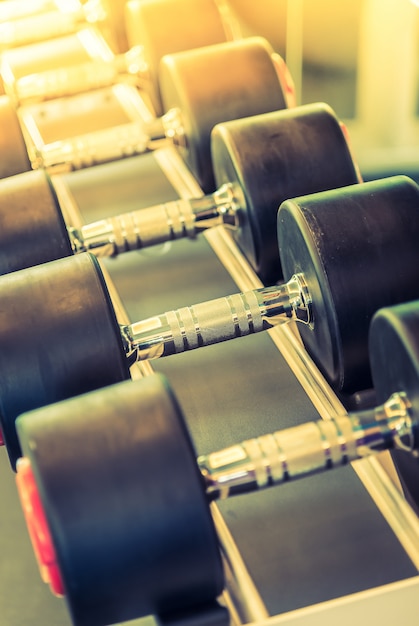 Close-up of dumbbells in row