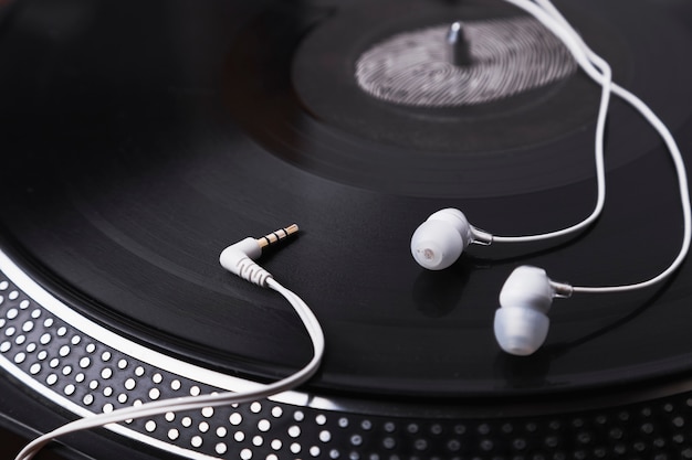 Close-up earphones on record player