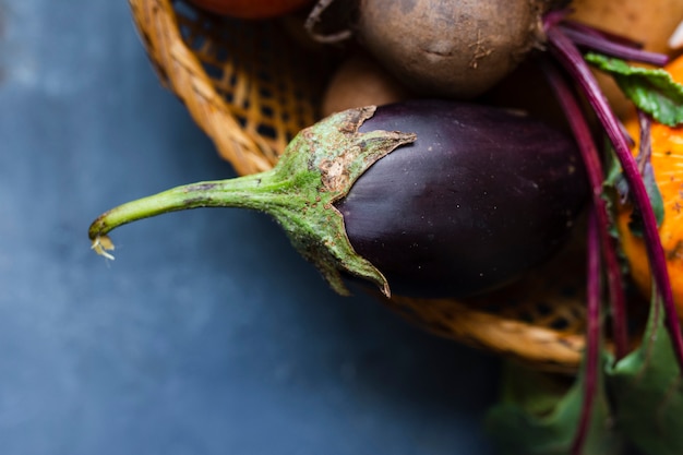 Close-up an eggplant in a basket