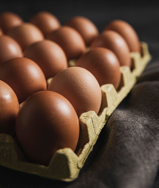 Close-up eggs package on cloth