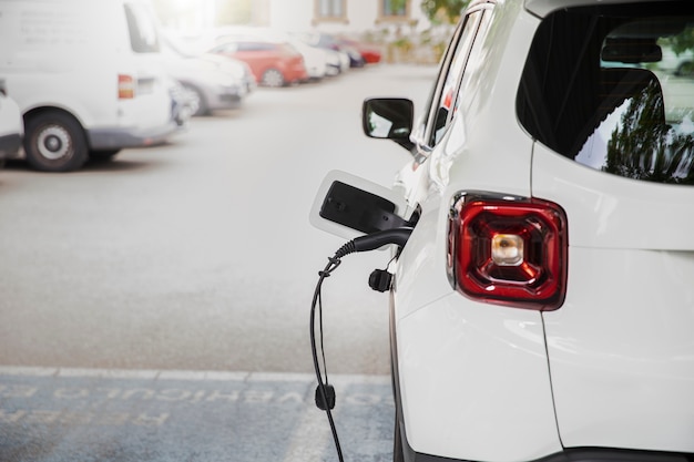 Free photo close up on electric car charging