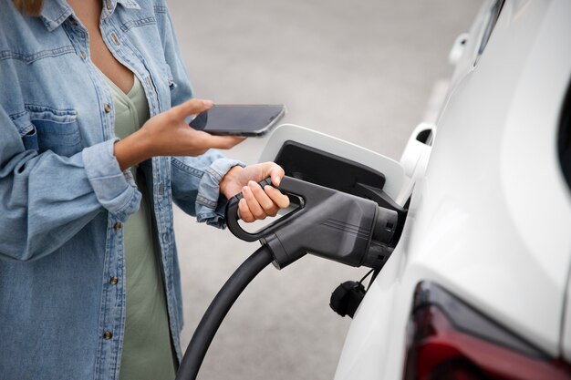 Close up on electric car charging