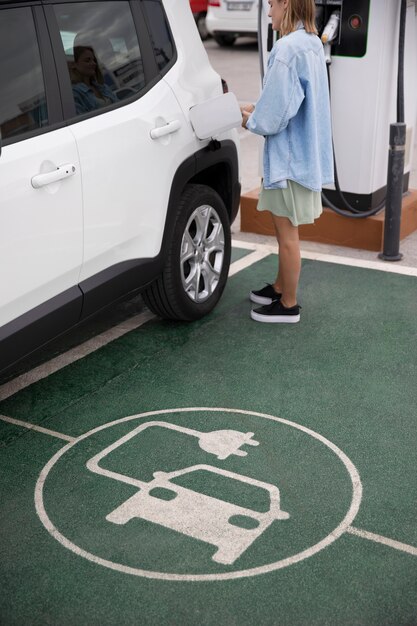 Close up on electric car charging