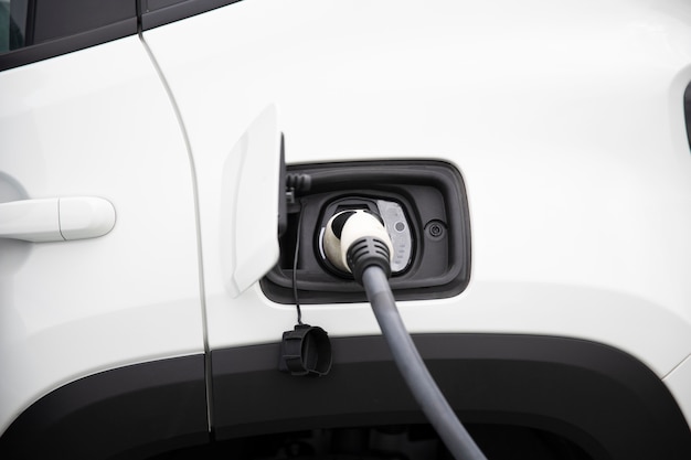 Close up on electric car charging