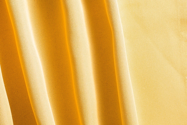 Крупным планом элегантный золотой фон ткани