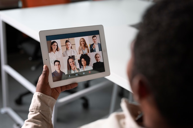 Close up employee holding tablet