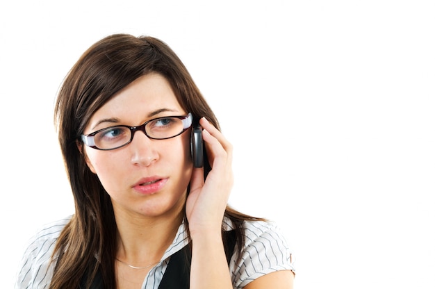 Close-up of employee with glasses talking on the phone