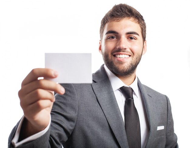 Close-up of entrepreneur holding a blank business card