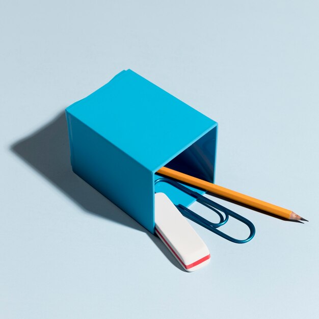 Close-up eraser with paper clip and pencil