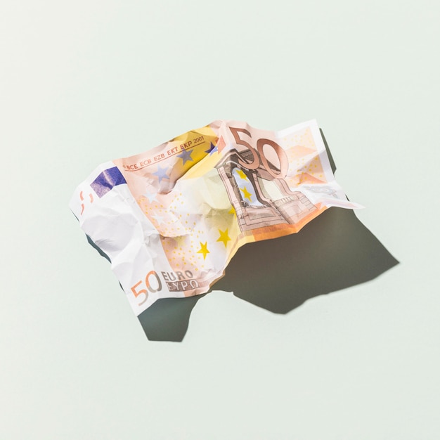 Закройте банкноту евро с копией пространства