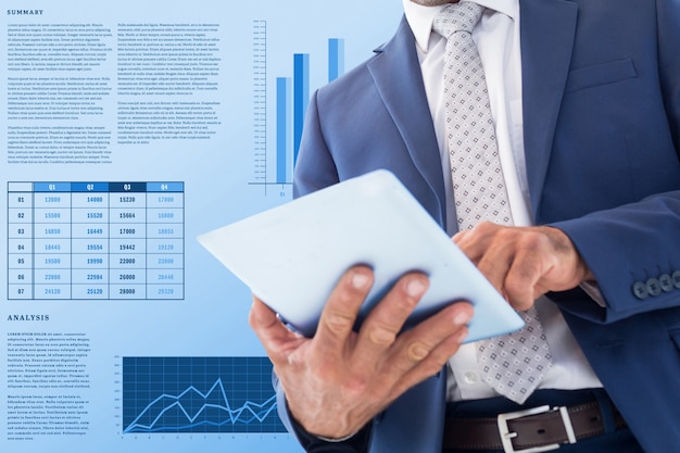 Close-up of executive working with his tablet