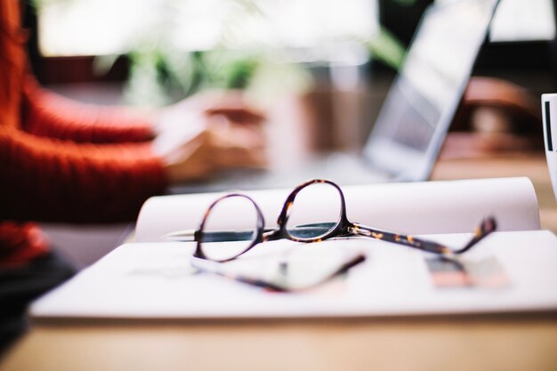 Close-up of eyeglasses on desktop