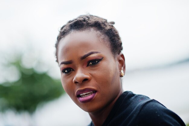 Close up face of african american woman in black