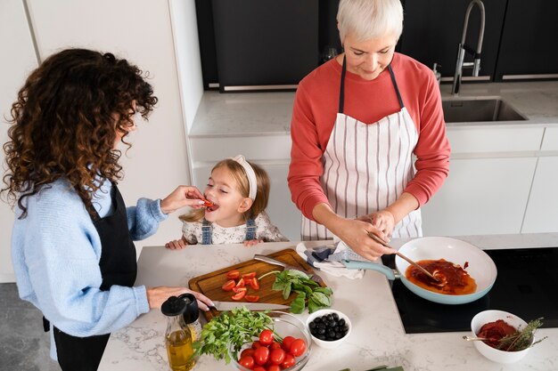 Close up on family enjoying food together