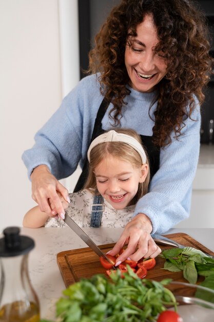 Close up on family enjoying food together