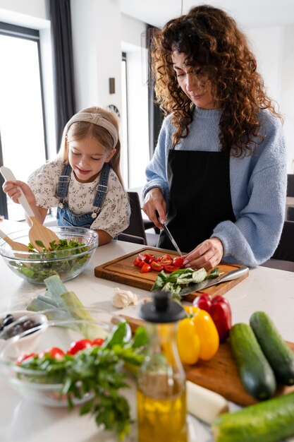 Close up on family enjoying food together