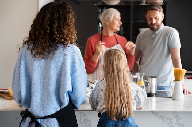 Close up on family enjoying food together