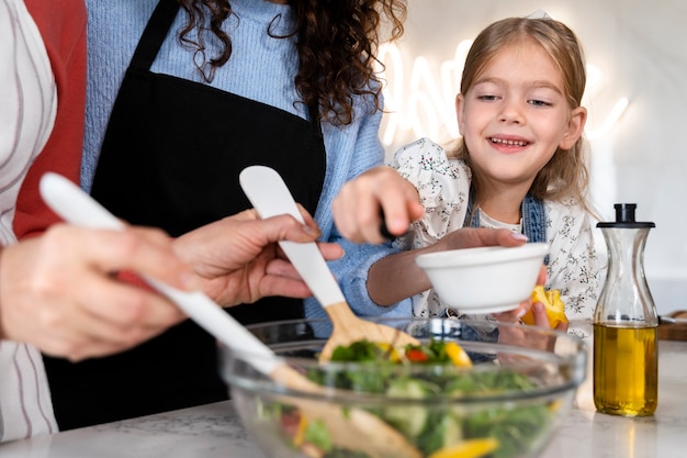 Close up on family enjoying food together