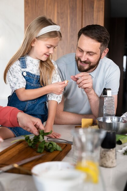 Close up on family enjoying food together