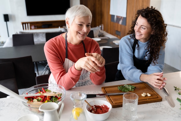 Close up on family enjoying food together