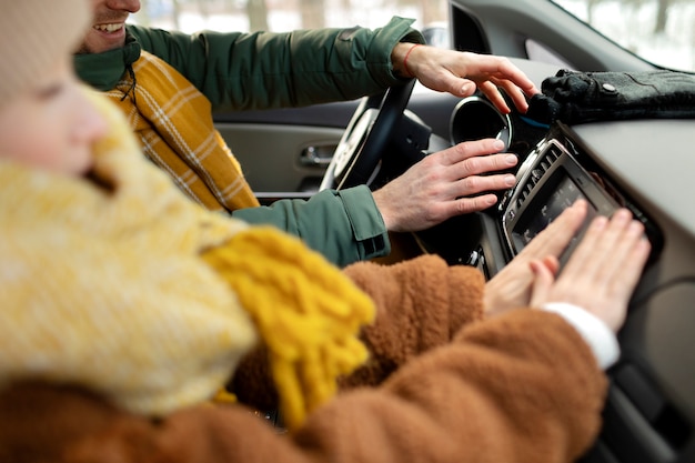 Close up family traveling by car