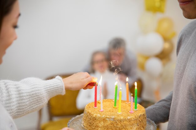 Close up family with birthday cake