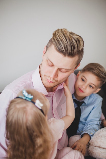 Close-up of father looking at his daughter