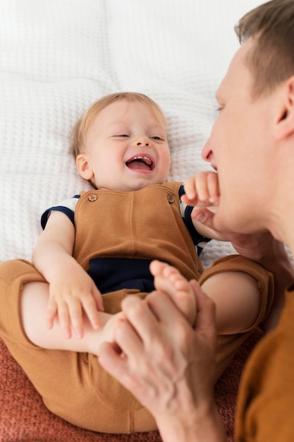 Close up father with smiley kid