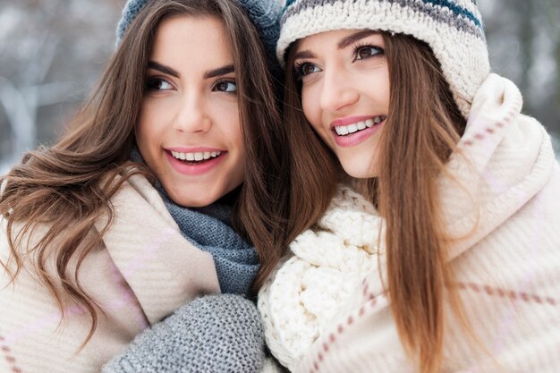 Close up of female friends during the winter