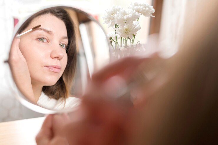 Free Photo close-up female making eyebrow form