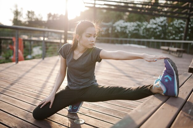 Close-up of flexible sportswoman