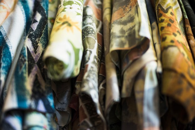 Close-up of floral shirts in clothes store