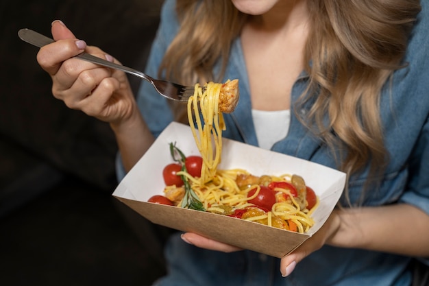 Free photo close up on food lover eating