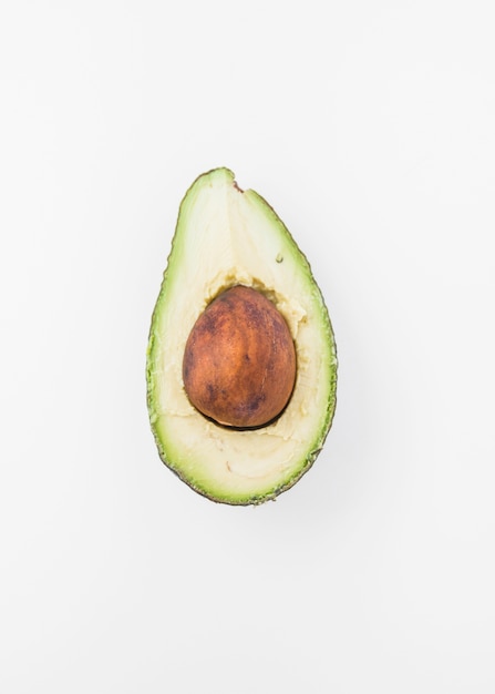 Close-up of fresh avocado isolated on white backdrop