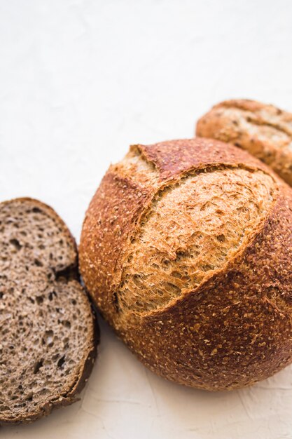 Close-up fresh bread on white surface