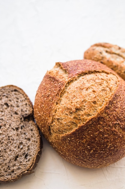 Close-up fresh bread on white surface