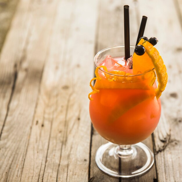 Close-up of fresh cocktail on wooden background