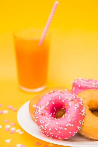 Close-up of fresh donuts on plate