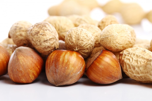 Close up of fresh hazelnuts and peanuts