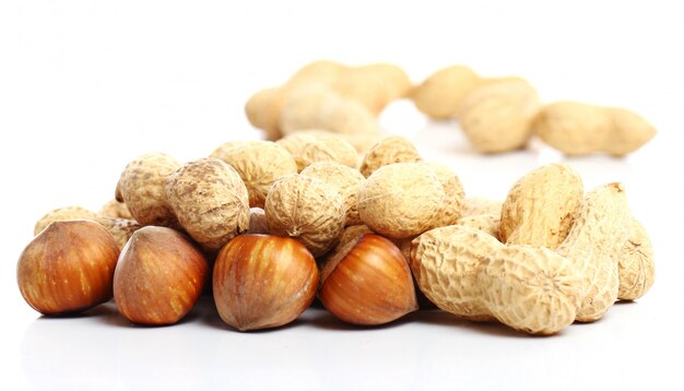 Close up of fresh hazelnuts and peanuts
