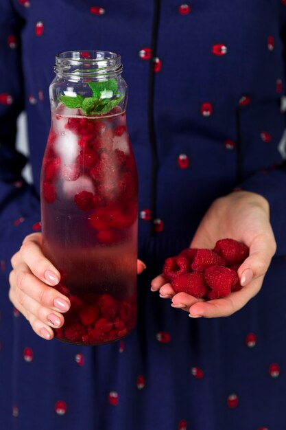 Close up fresh iced raspberry juice