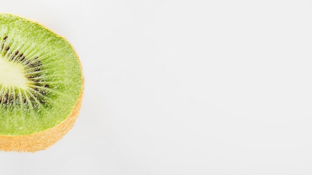 Close-up of fresh kiwi fruit on white background