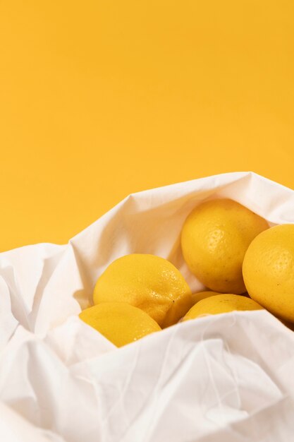 Close-up fresh lemons in a bag