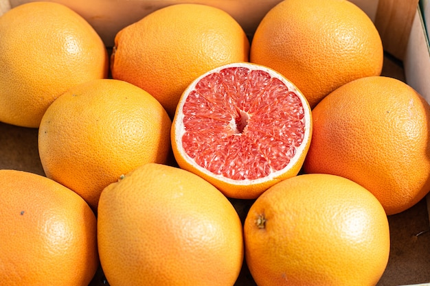 Close up of fresh oranges and grapefruits