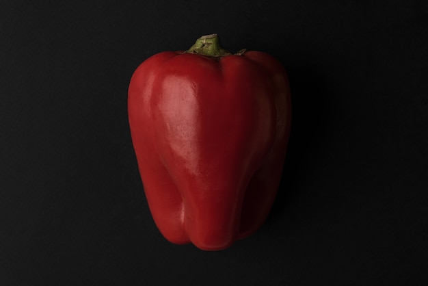 Close up of fresh red bell pepper isolated