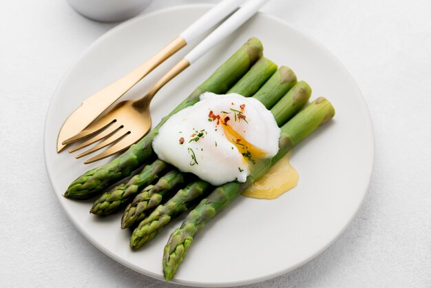 Close-up fried egg with asparagus