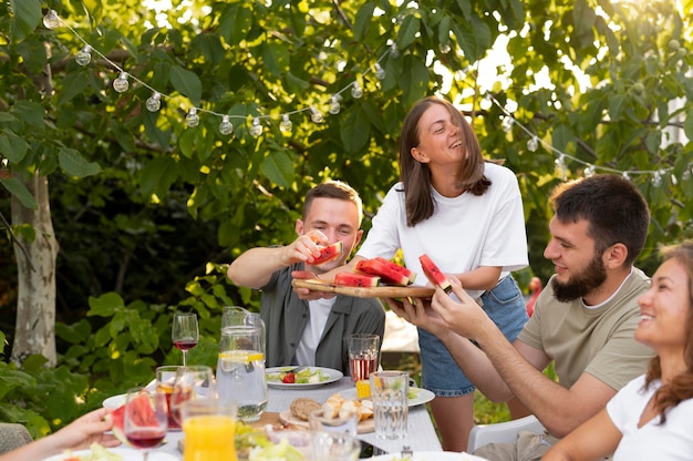 Close up friends with delicious watermelon