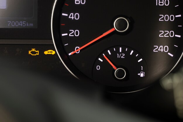 Close up on fuel level gauge in vehicle