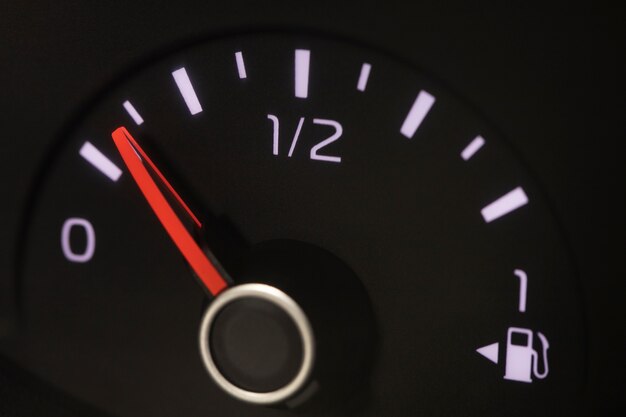 Close up on fuel level gauge in vehicle